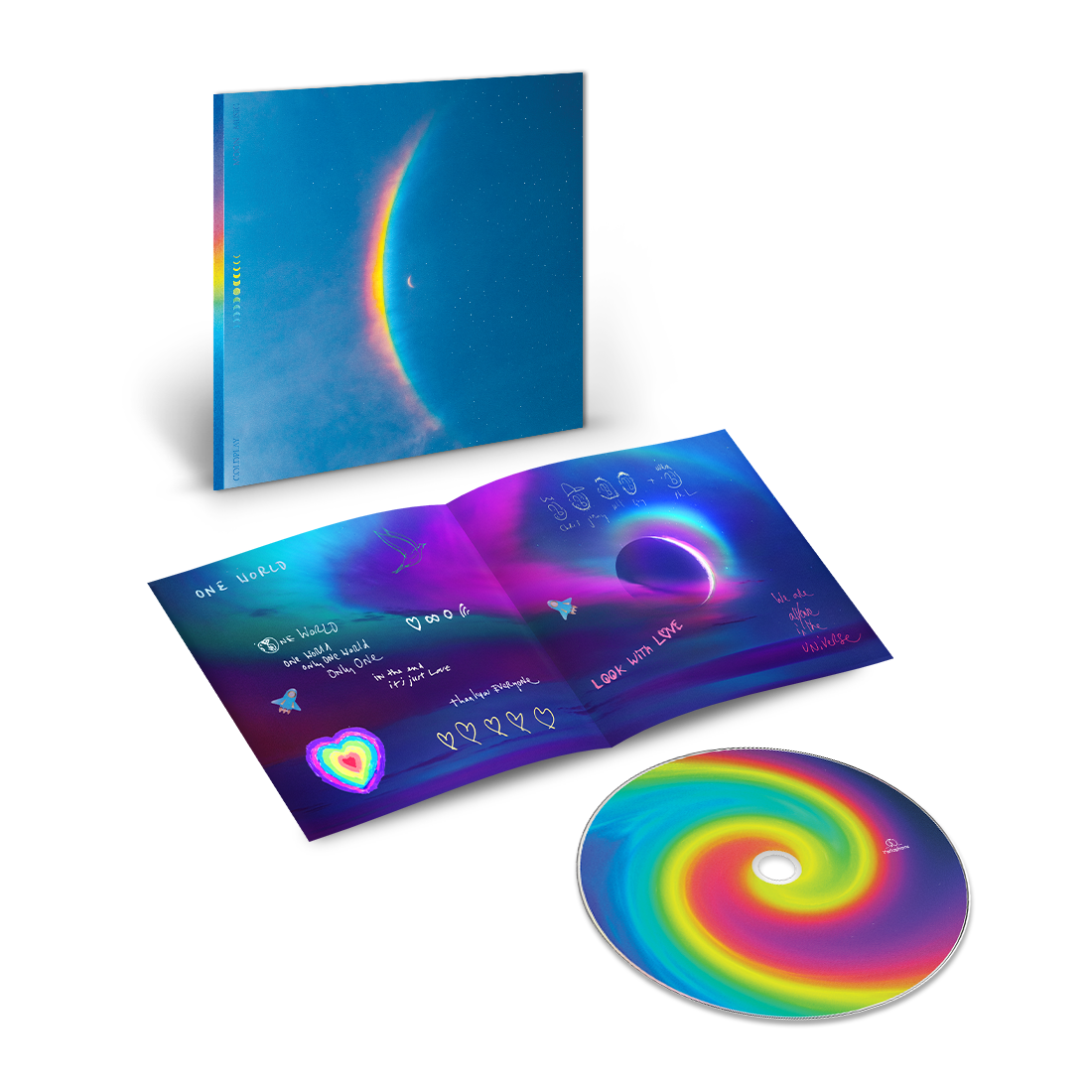 The cover shows a centered🌘with a large, arced rainbow light dispersion to the left. Colors flow from red to orange, yellow, green, light&dark blue on a starry night sky. The CD center is a spiral of blues, pinks, purples, yellows&greens. A hand-written lyric booklet is on the One World page, in blue, purple&pink. It reads:LOOK WITH LOVE,WE ARE ALL ONE IN THE UNIVERSE. We see cartoon faces of all band members, stars, rocket ships, a distant planet, a dove♥1large in colors of a🌈others white&small